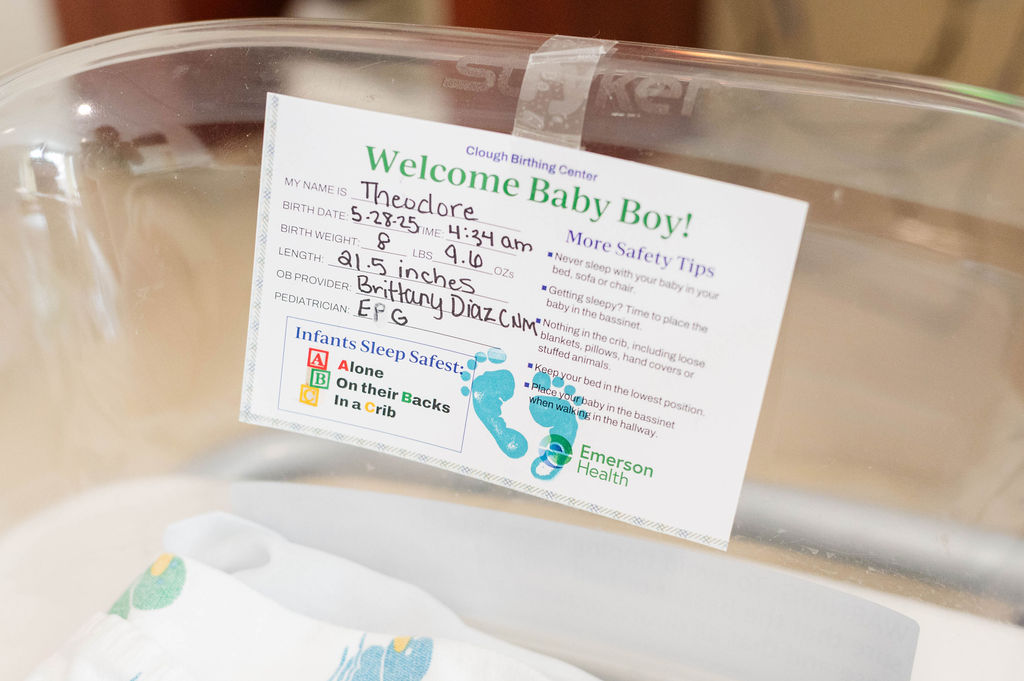 Baby boy name tag on bassinet in hospital