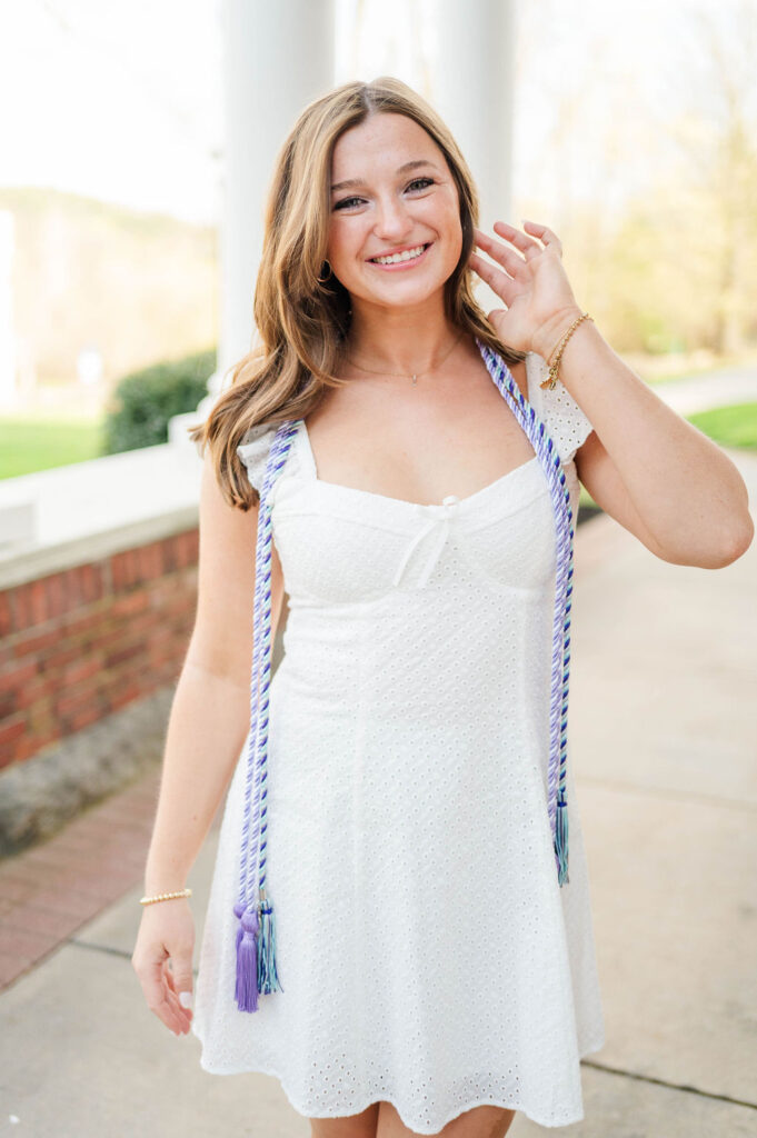 Cute college grad with cords