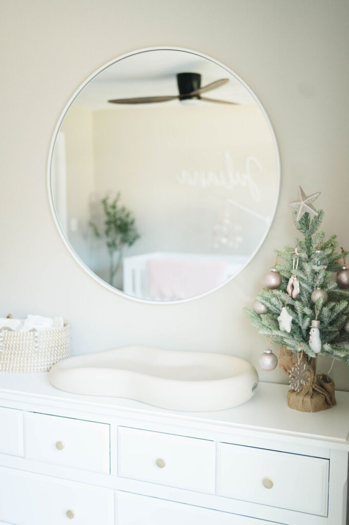 Changing table, mirror, and small christmas tree in Douglas, MA