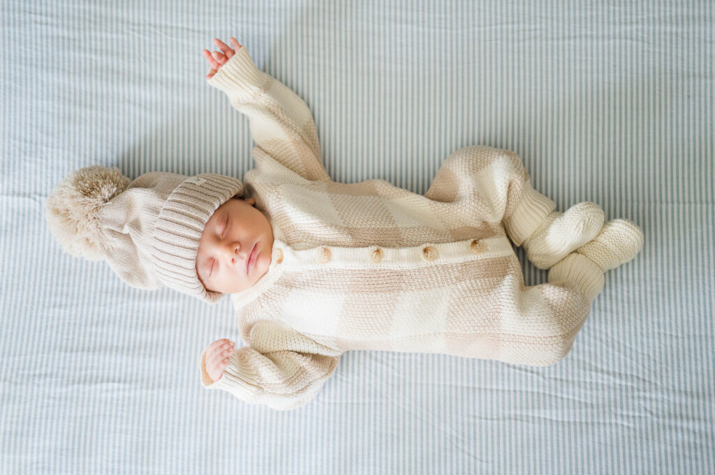 North Attleboro newborn photographer image of baby sleeping in crib