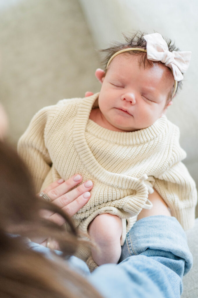 Mansfield newborn photographer image of newborn asleep in mom's arms