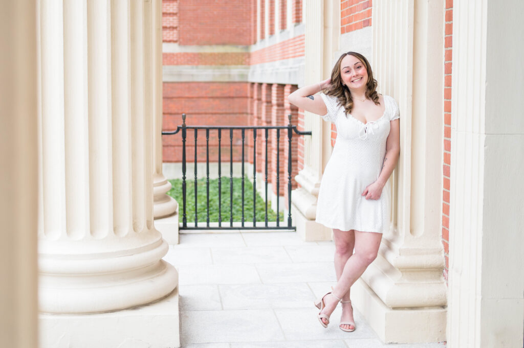 Worcester state university grad photography session of grad in white dress