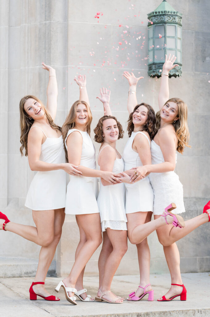 WPI grads throwing confetti