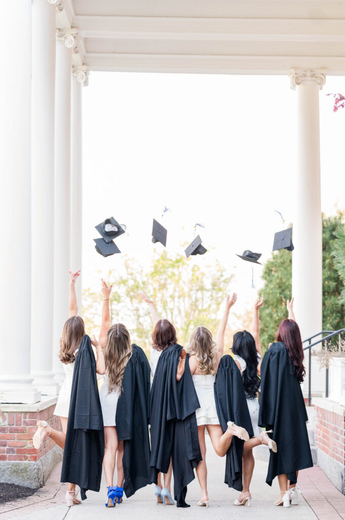 Worcester grad photographer cap and gown image of the caps being thrown